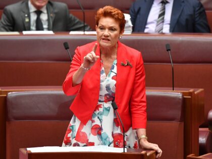 CANBERRA, AUSTRALIA - MARCH 18: Senator Pauline Hanson speaks as Senators Malcolm Roberts