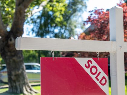 A "Sold" sign in front of a home in Sacramento, California, US, on Monday, July 3, 2023. T