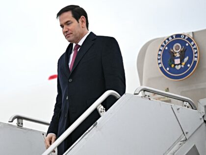 US Secretary of State Marco Rubio steps off his plane upon arrival at the John C. Munro Ha