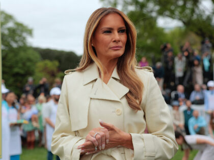 WASHINGTON, DC - APRIL 21: First lady Melania Trump looks on as U.S. President Donald Trum