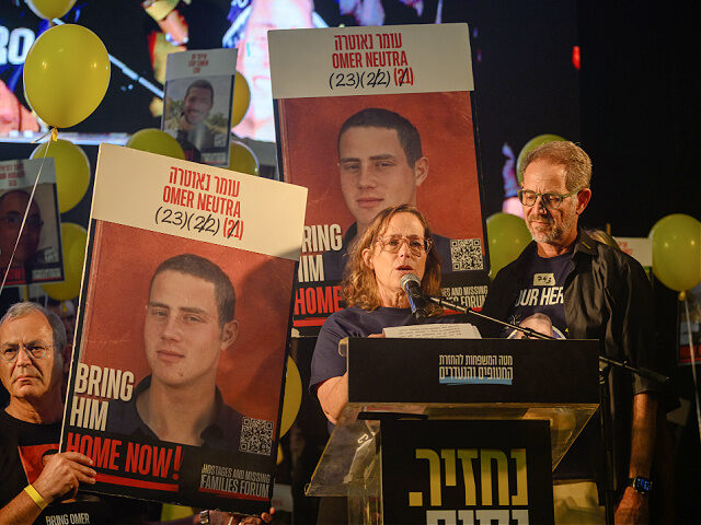 oct18-2025-Omer-Neutra-parents-gettyimages TEL AVIV, ISRAEL - OCTOBER 18: Orna Neutra, standing next to her husband, Ronen Neutra, th