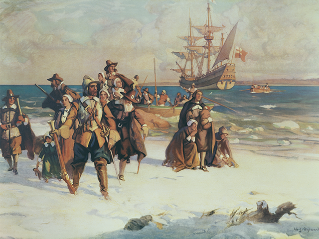 The Pilgrim Fathers arrive at Plymouth, Massachusetts, on board the Mayflower in November