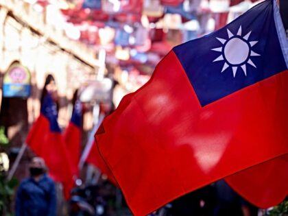 Taiwanese flags are pictured on the street in Kinmen on October 29, 2025. Taiwan has long