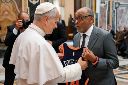 American director Spike Lee, a rabid Knicks fan, brought the team's jersey as a gift