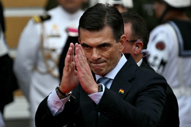Bolivia's Rodrigo Paz gestures as he prepares to be sworn in as president in La Paz