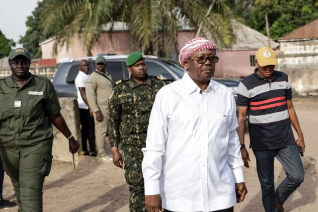 Embalo, pictured here at a polling station on November 23, went to Senegal after the milit