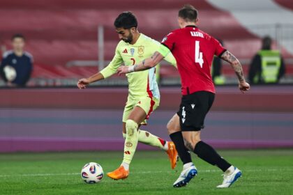 Spain's Ferran Torres (L) put the game to bed 10 minutes before the break by converti