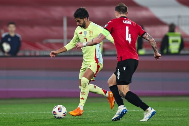 Spain's Ferran Torres (L) put the game to bed 10 minutes before the break by converti