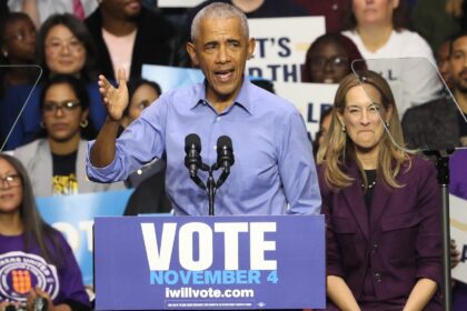 Former US president Barack Obama addresses a crowd at a campaign rally for New Jersey Demo