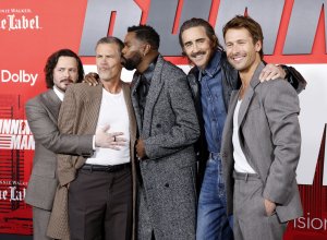Colman Domingo, Glen Powell step out for 'Running Man' premiere