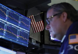 Dow Jones falls 800 points amid Fed rate cut doubts