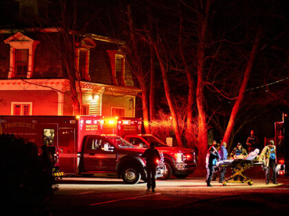 12-13-25-Brown-University-shooting-Rhode-Island-getty First responders with the Providence Fire Department maneuver an empty stretcher near the