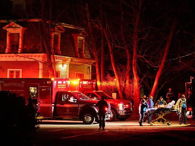 12-13-25-Brown-University-shooting-Rhode-Island-getty First responders with the Providence Fire Department maneuver an empty stretcher near the