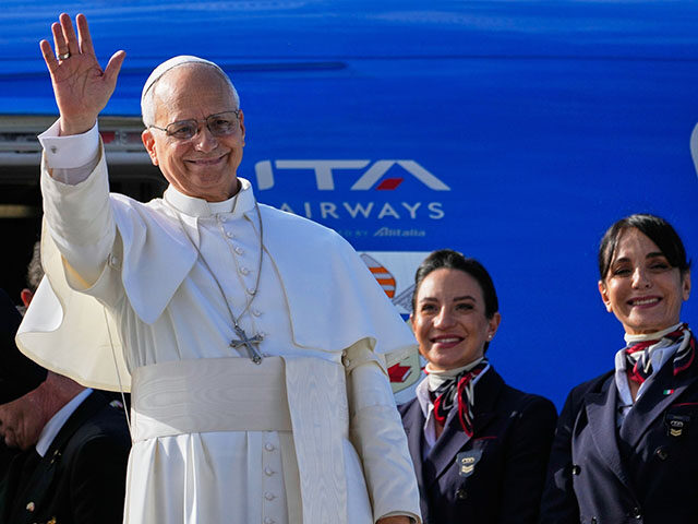Title: APTOPIX Lebanon Mideast Pope Image ID: 25336422943098 Article: Pope Leo XIV waves a