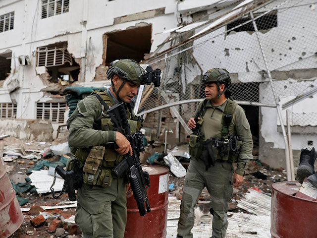 Title: APTOPIX Colombia Attack Image ID: 25351547008686 Article: Police inspect buildings