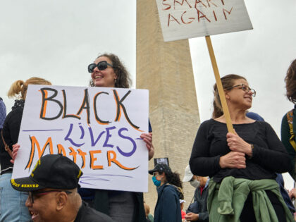 Protesters gather on the National Mall for the "Hands-Off" protest against the a