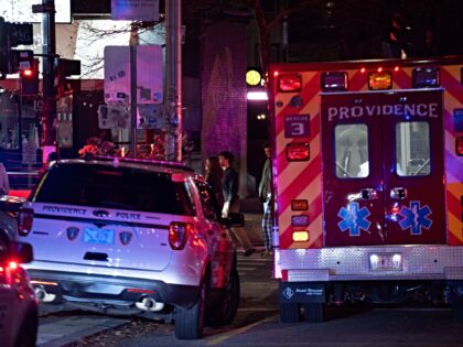 PROVIDENCE, RHODE ISLAND DECEMBER 13: Emergency responders work at the scene near Brown Un
