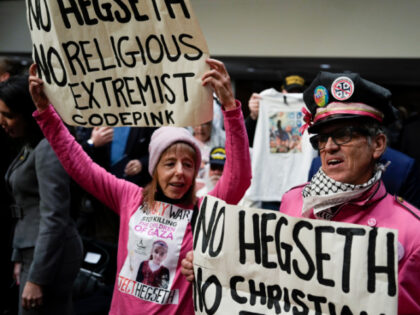 Members of the protest group Code Pink protest Pete Hegseth, President-elect Donald Trump&