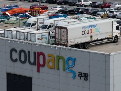 Coupang building and delivery trucks