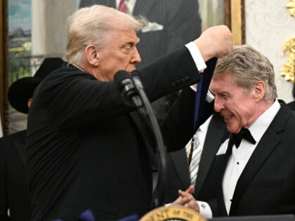 Kennedy Centre Honours recipient Broadway actor Michael Crawford receives a medal from US