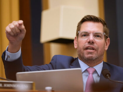 Rep. Eric Swalwell, D-Calif., speaks to FBI Director Kash Patel as he appears before the H
