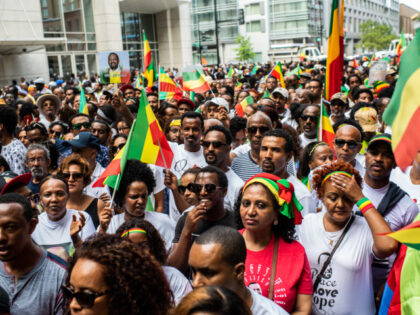Ethiopians wait to enter Walter E. Washington Convention Center for the the newly-elected