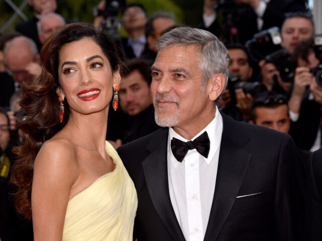 Actor George Clooney and his wife Amal Clooney attend the "Money Monster" premie