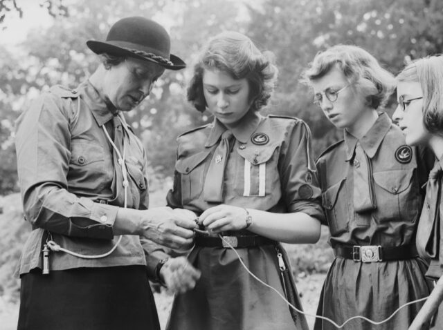 Princess Elizabeth Princess Elizabeth learns to tie a knot with the girl guides in Frogmore, Windsor, England