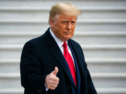 WASHINGTON, DC - DECEMBER 12: U.S. President Donald Trump gives a thumbs up as he departs