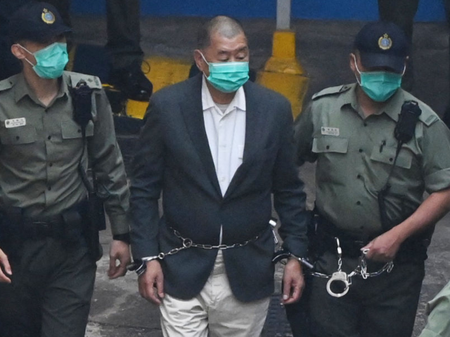 (FILES) In this file photo taken on December 12, 2020, Hong Kong pro-democracy media tycoo