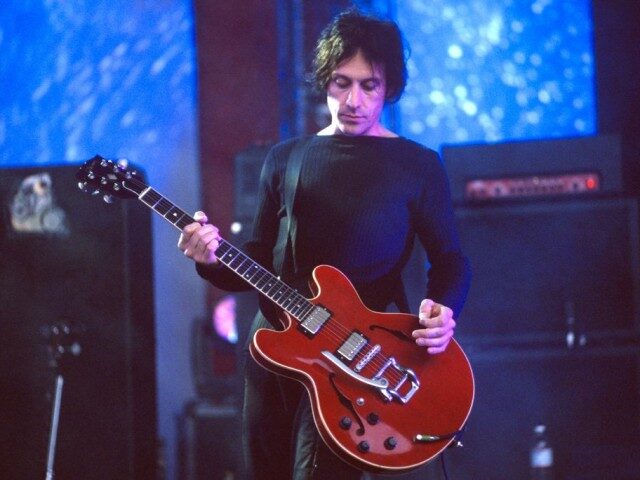 Perry Bamonte of The Cure performs at Shoreline Amphitheatre on June 2, 2000 in Mountain V