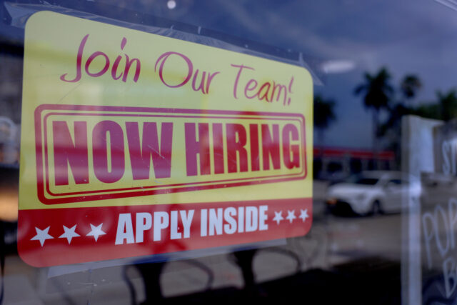 U.S. Economy Adds 253,000 Jobs In April, Unemployment Rates Drops To 3.4 Percent MIAMI, FLORIDA - MAY 05: A 'Now Hiring' sign posted in the window of a restauran
