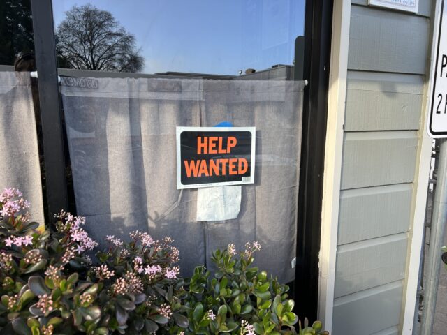 Help Wanted Help Wanted sign in store window in Lafayette, California, January 8, 2023. (Photo by Smit