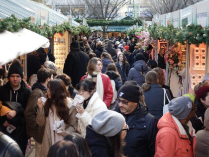NEW YORK, NEW YORK - DECEMBER 19: People visit Union Square holiday market as Christmas ap