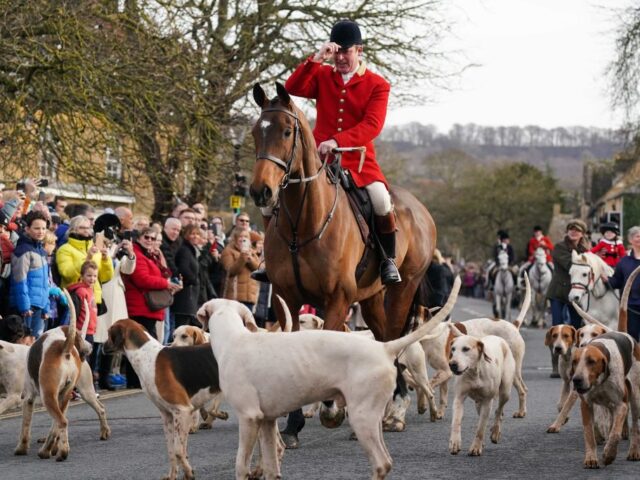 Riders and hounds during the annual North Cotswold Boxing Day hunt in Broadway, Worcesters