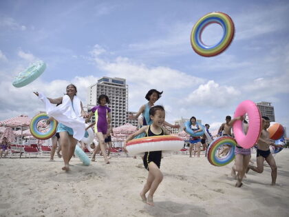 Domestic tourists visit the beach at Wonsan Kalma Coastal Tourist Area in Wonsan, North Ko