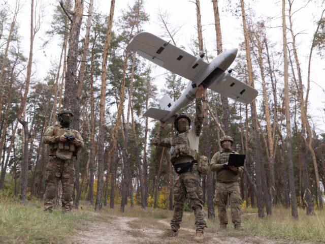 KHARKIV OBLAST, UKRAINE - SEPTEMBER 24: Ukrainian soldiers prepare the UAV 'Evanger' for l