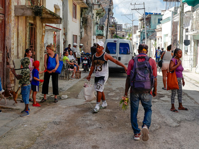 Residents of Havana's Jesus Maria neighborhood remain on the street after their homes were