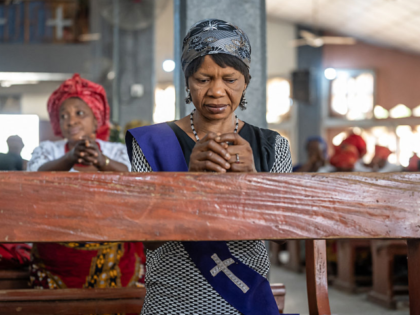 Women pray at the Saint Michael's Cathedral during the Sunday's service in Minna on Novemb