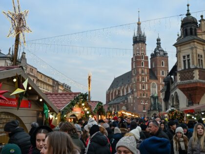 KRAKOW, POLAND NOVEMBER 29:A dense crowd of tourists and locals fills the Christmas market
