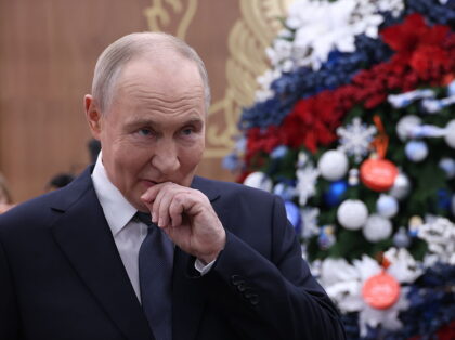 MOSCOW, RUSSIA - DECEMBER 3: Russian President Vladimir Putin looks on while visiting the