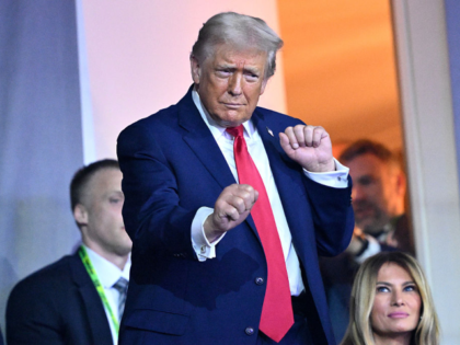 WASHINGTON, DC - DECEMBER 05: U.S. President Donald Trump dances to the final performance