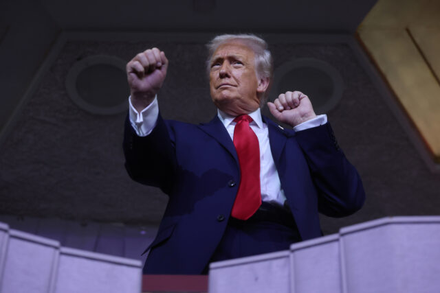 WASHINGTON, DC - DECEMBER 05: U.S. President Donald Trump dances to the final performance
