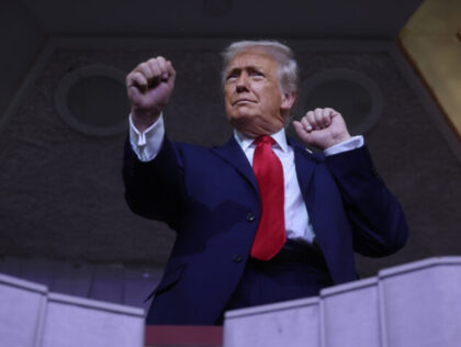 WASHINGTON, DC - DECEMBER 05: U.S. President Donald Trump dances to the final performance