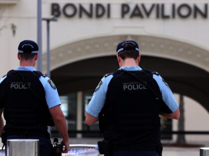 Police inspect at the scene of a shooting at Bondi Beach in Sydney on December 15, 2025. T