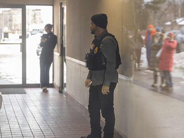 Federal agents execute search warrant at Ultimate Home Health Services in Medicaid fraud probe BLOOMINGTON, UNITED STATES â" DECEMBER 18: Federal agents stand in the hallway of an offi