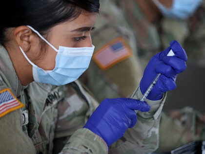 GettyImages1306186336 A U.S. Army soldier from the 2nd Armored Brigade Combat Team, 1st Infantry Division, prepa