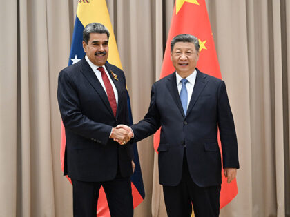 Chinese President Xi Jinping meets with Venezuelan President Nicolas Maduro on the sidelin