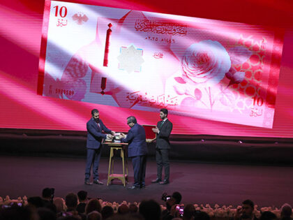 Syrian President Ahmed Hussein al-Sharaa attends a ceremony unveiling new Syrian banknotes