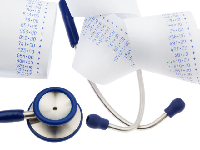 symbolic photo costs of health service, stethoscope and receipt (Photo by Wodicka/ullstein